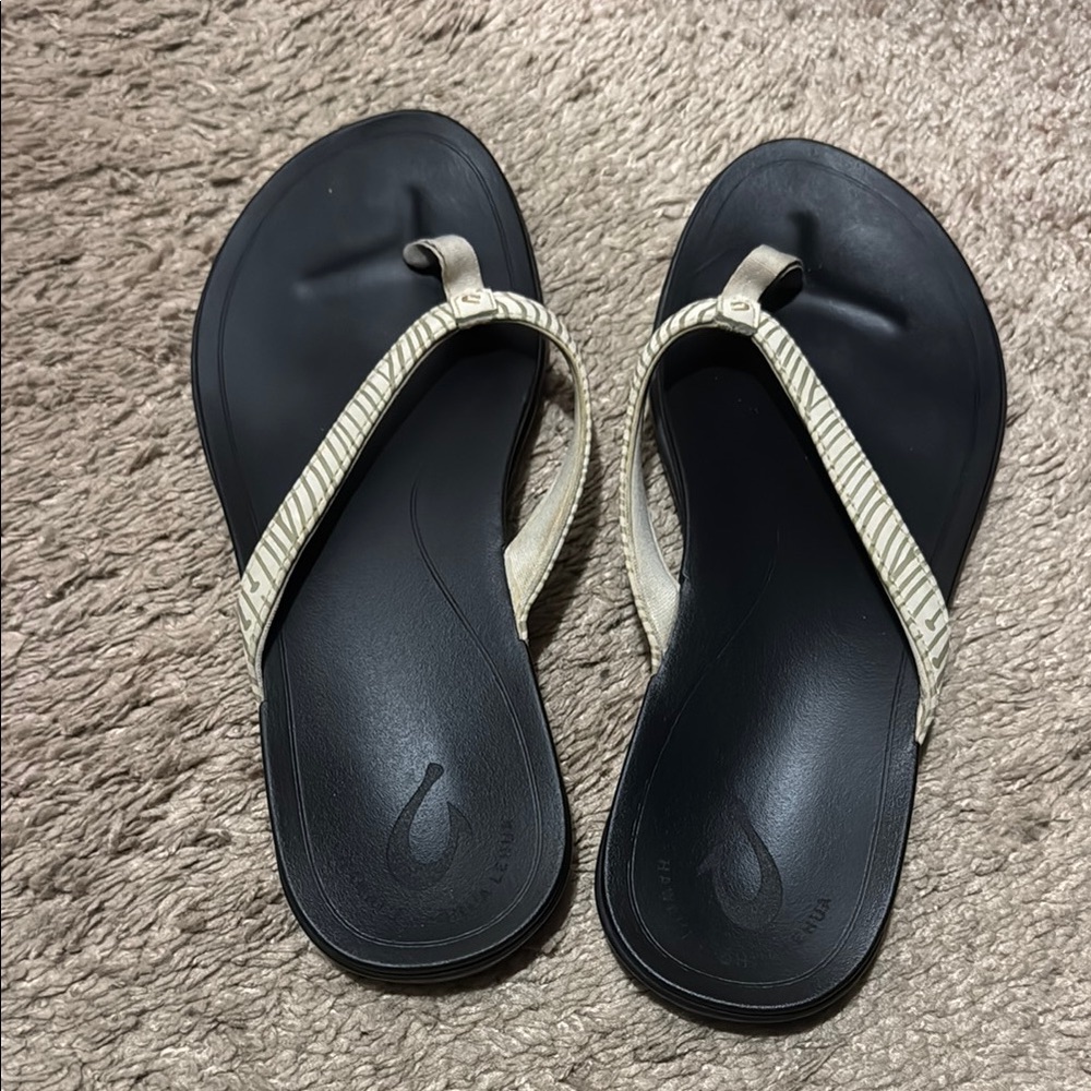 SOLD. OluKai Black and Cream Sandals